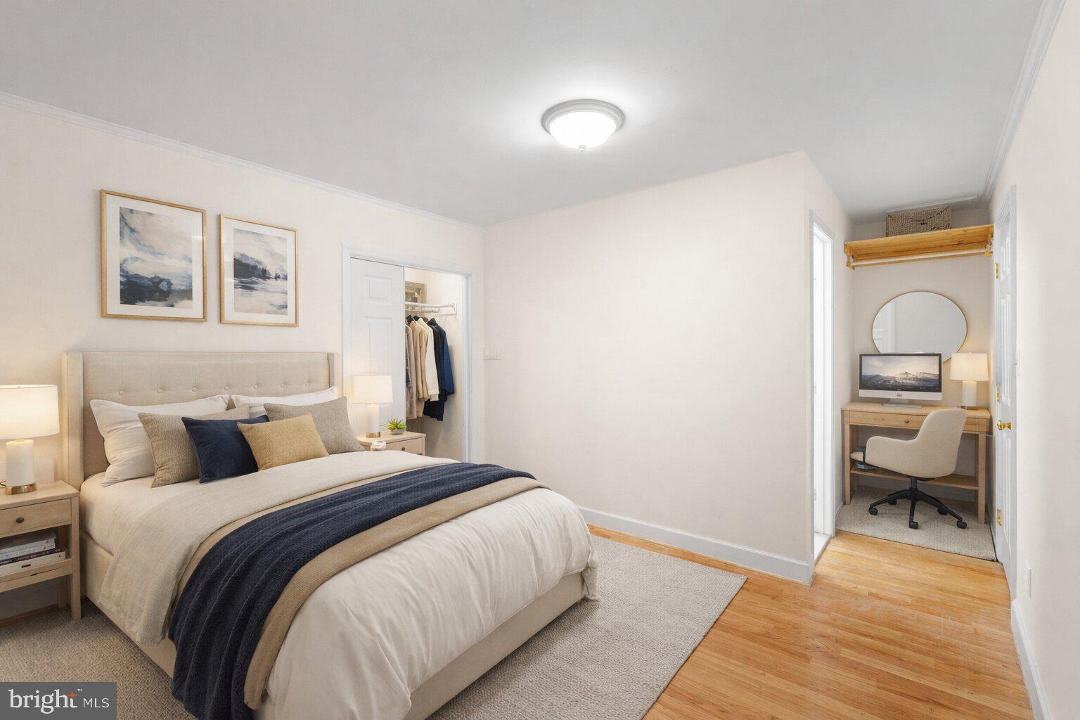 7423 Exmore Street Springfield, VA 22150 - Photo 24 of 39 a bedroom with a bed and a view of bedroom