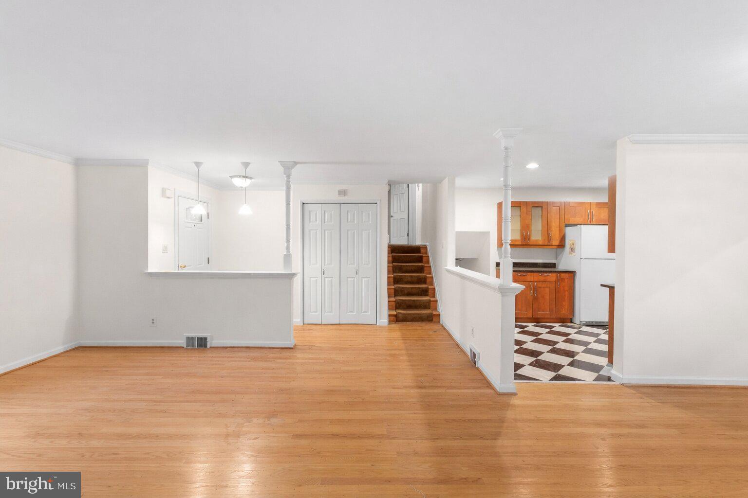 7423 Exmore Street Springfield, VA 22150 - Photo 6 of 39 a view of a kitchen with wooden floor