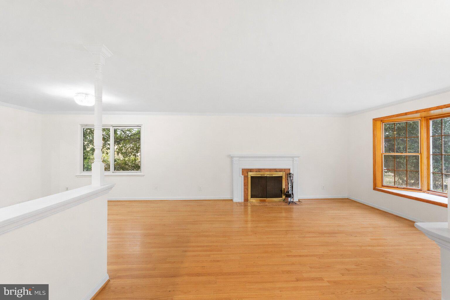 7423 Exmore Street Springfield, VA 22150 - Photo 7 of 39 a view of an empty room with a window