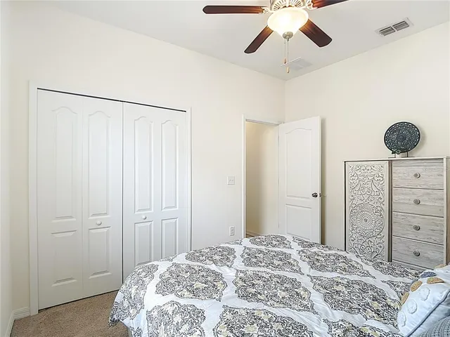 a room with furniture and a kitchen