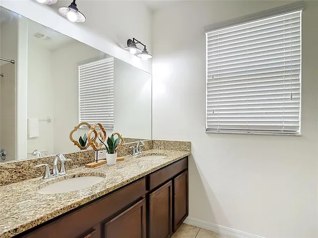 a view of workspace with furniture and window