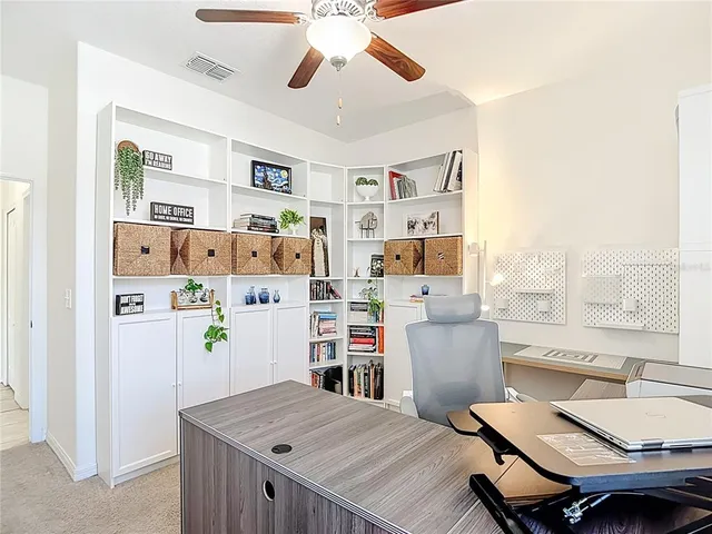 a view of room with cabinet and window