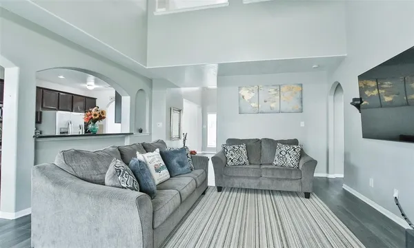 a living room with furniture and a couch