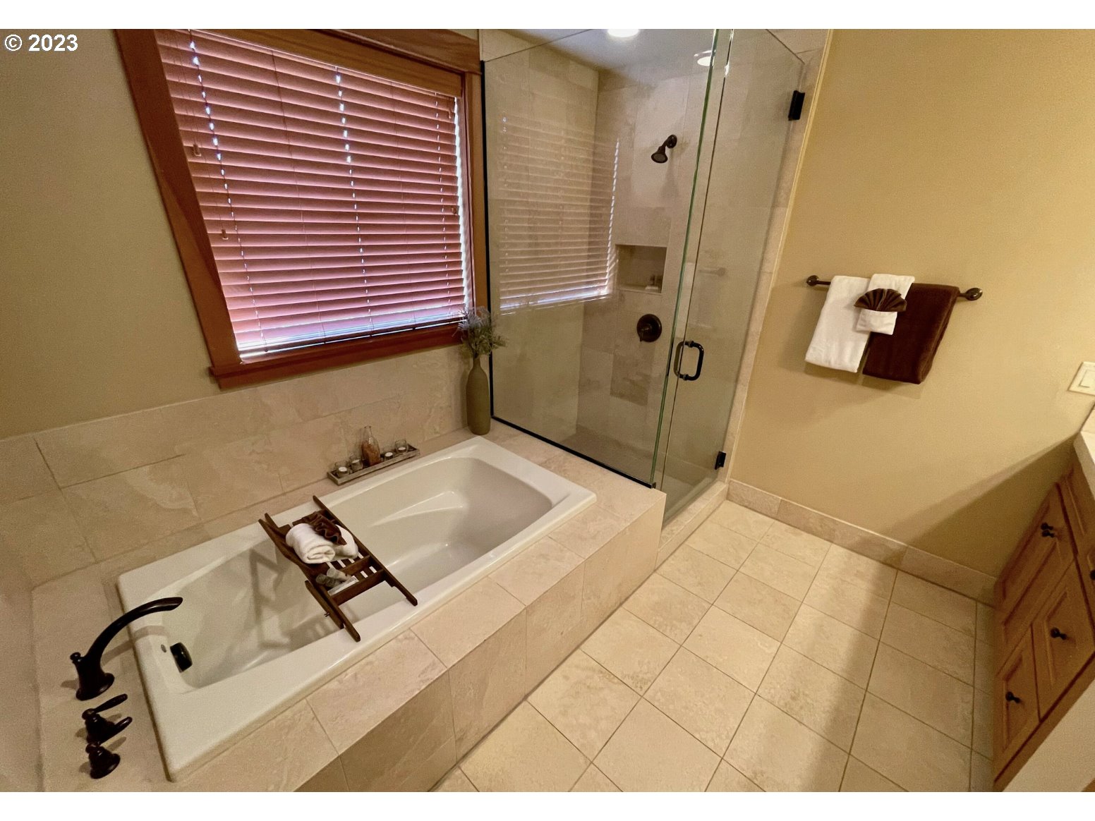 Lodges At Cannon Bea, Unit B2 Cannon Beach, OR 97110 - Photo 6 of 25 a bathroom with a sink and mirror