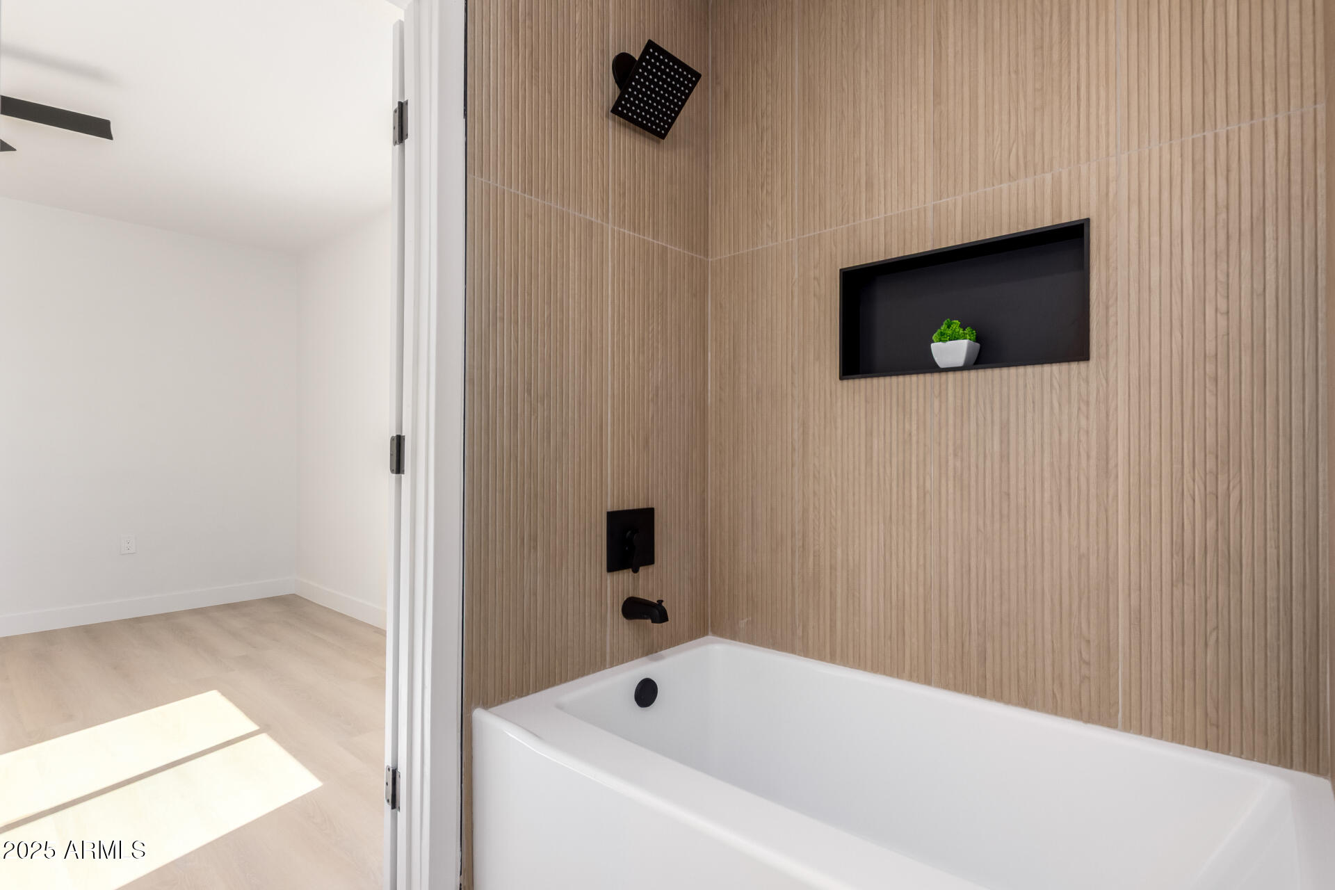 443 North Sycamore Mesa, AZ 85201 - Photo 22 of 42 a bathroom with a bathtub and a shower