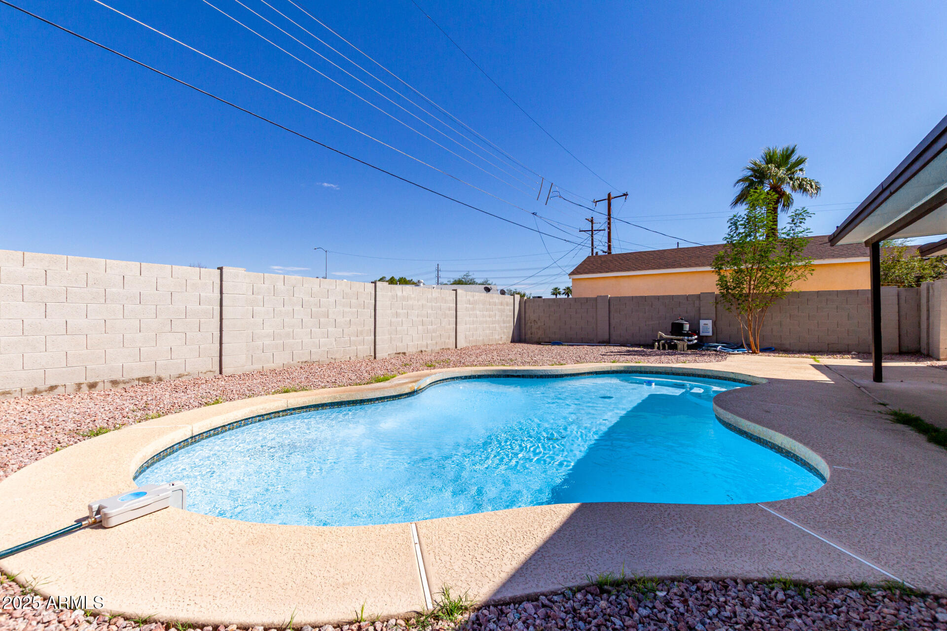 443 North Sycamore Mesa, AZ 85201 - Photo 41 of 42 a view of a kitchen with a sink and wooden cabinets