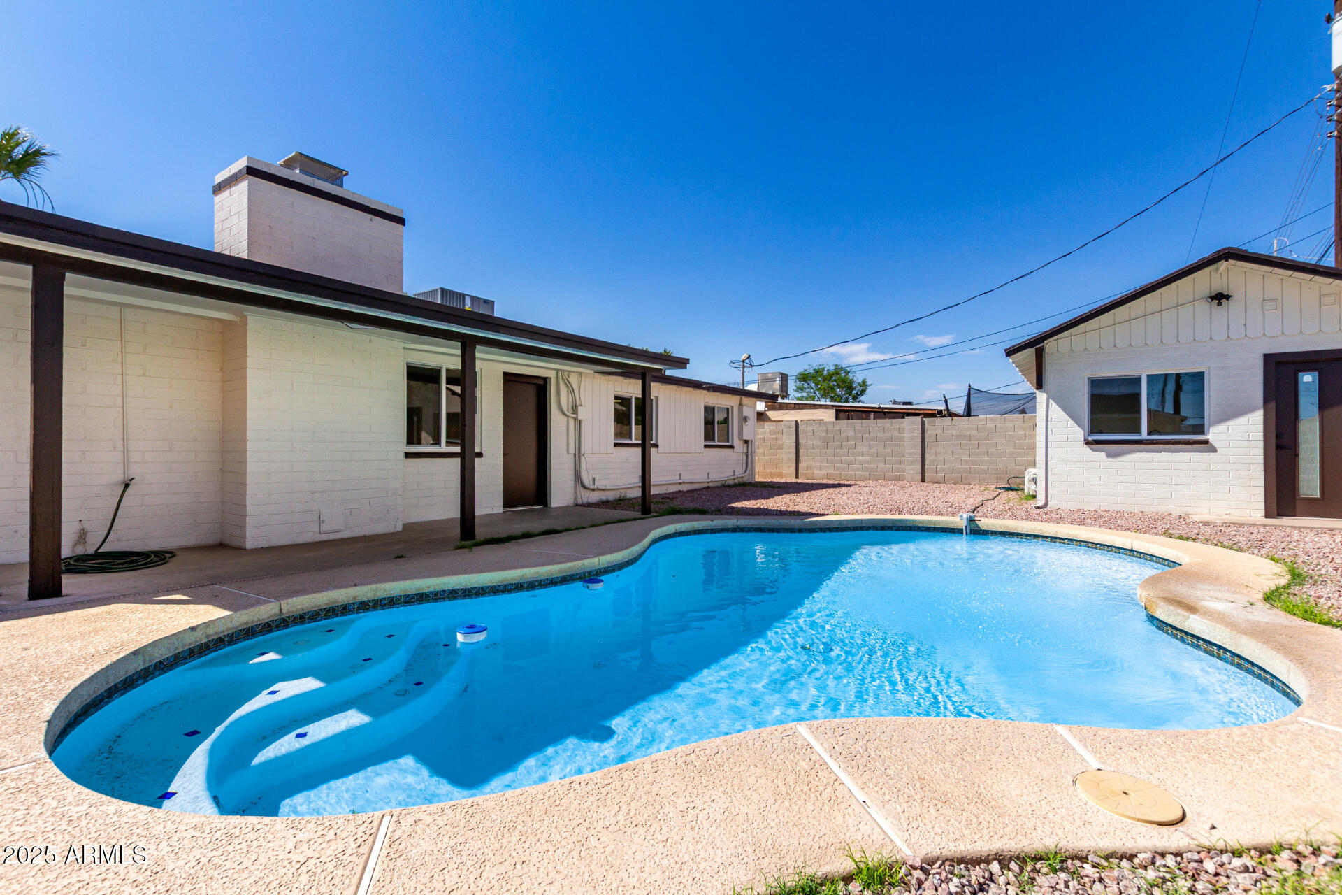 443 North Sycamore Mesa, AZ 85201 - Photo 42 of 42 a view of a house with swimming pool