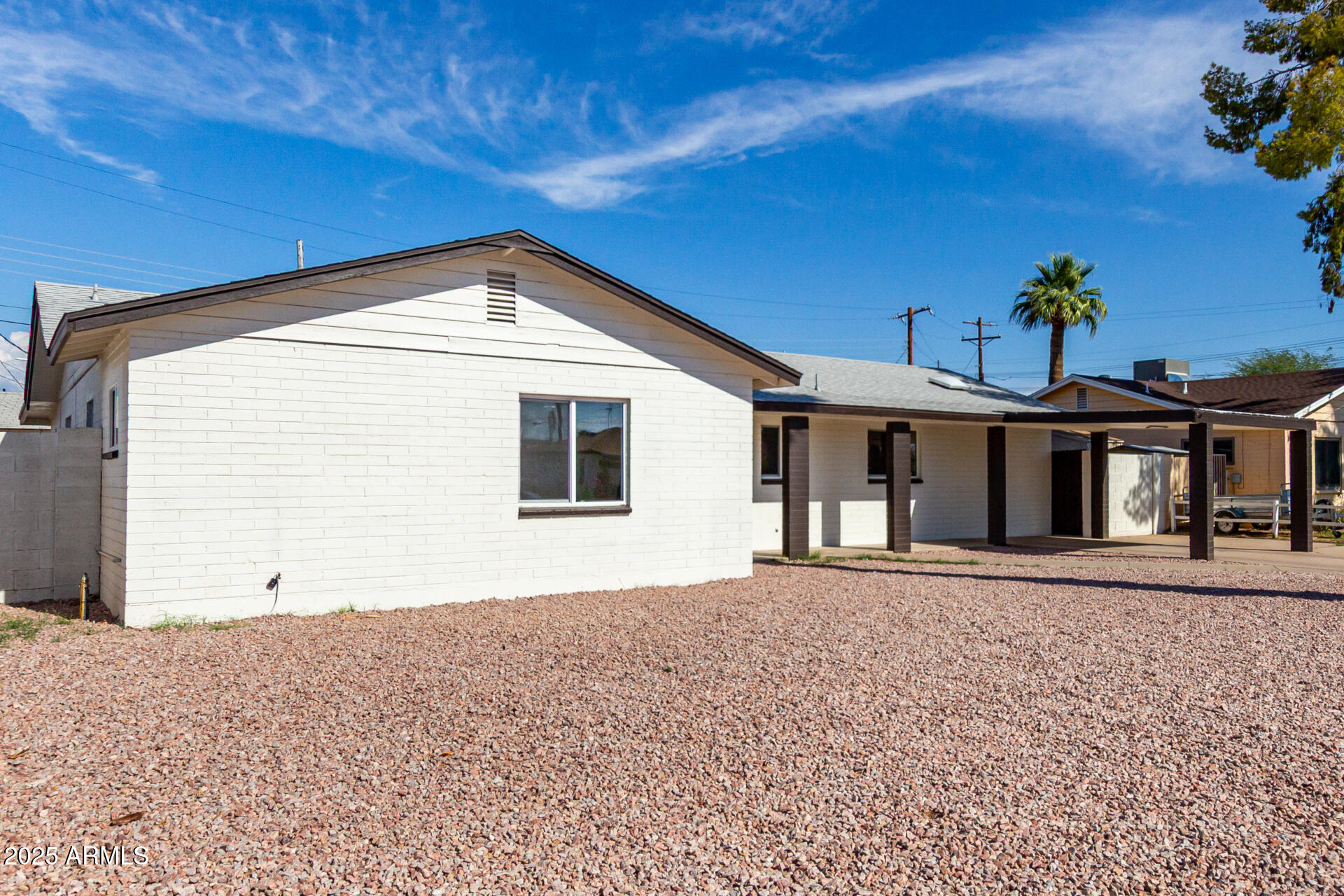 443 North Sycamore Mesa, AZ 85201 - Photo 6 of 42 a front view of a house with a garage