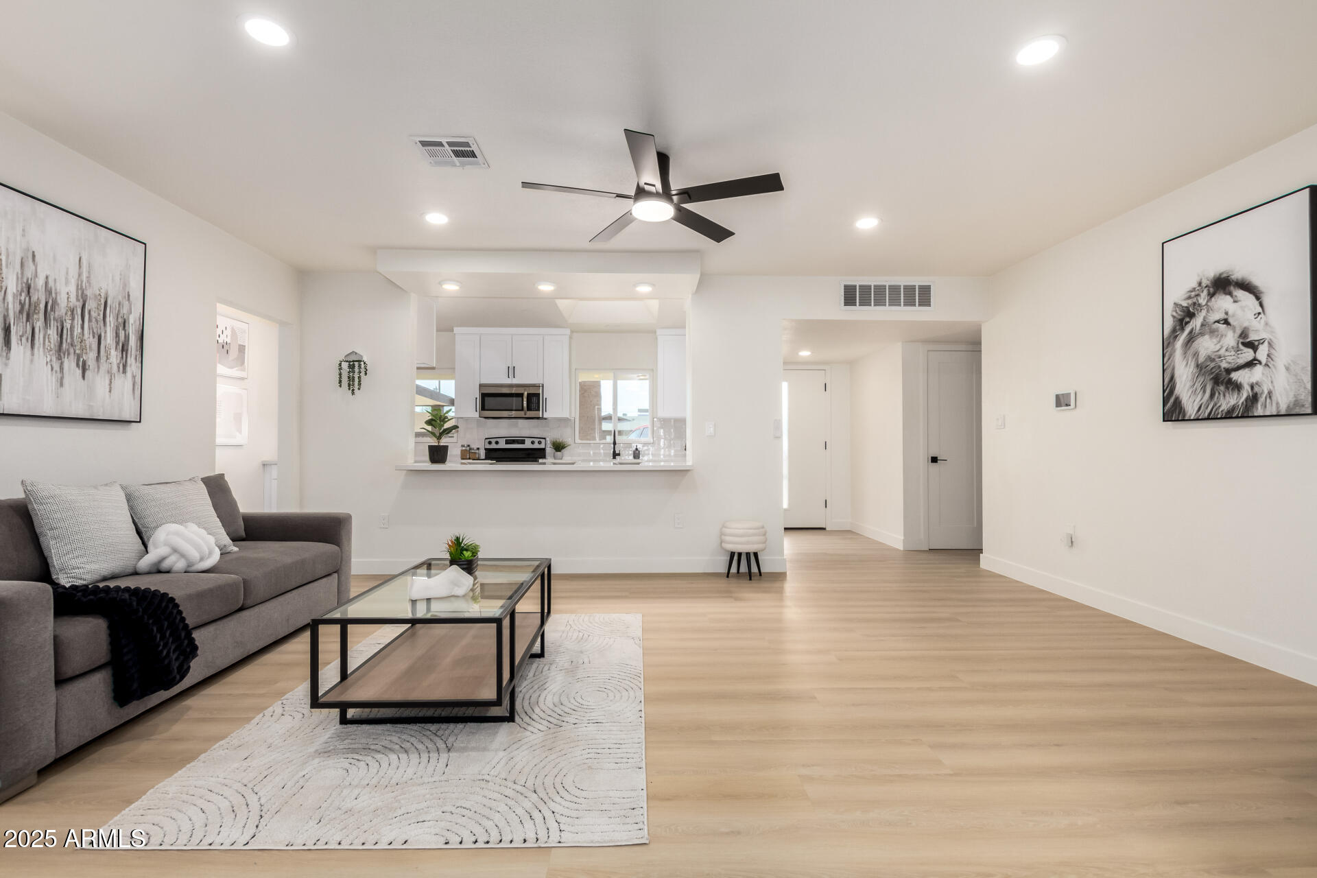 443 North Sycamore Mesa, AZ 85201 - Photo 9 of 42 a living room with furniture and kitchen view