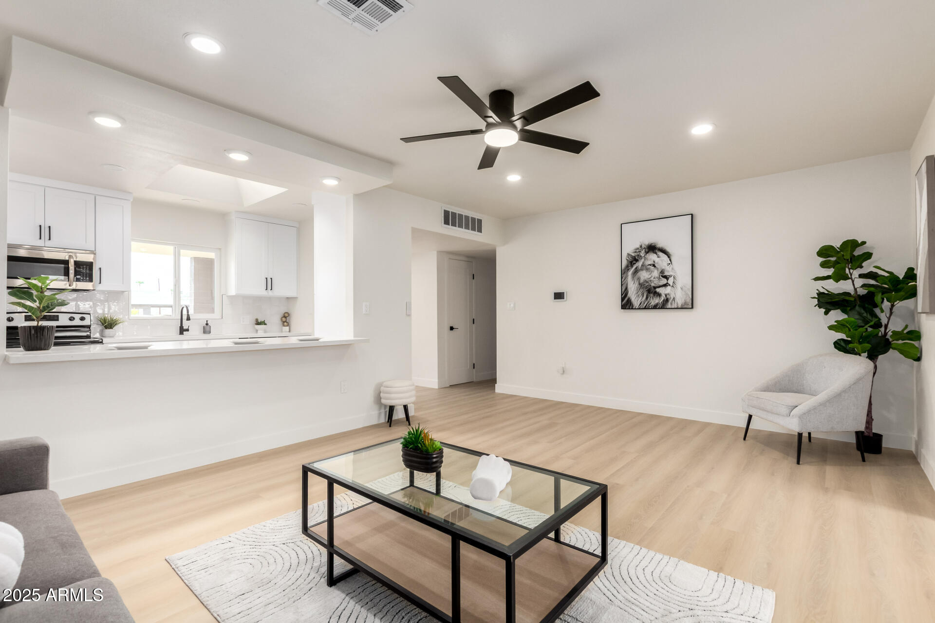 443 North Sycamore Mesa, AZ 85201 - Photo 10 of 42 a living room with furniture and a wooden floor