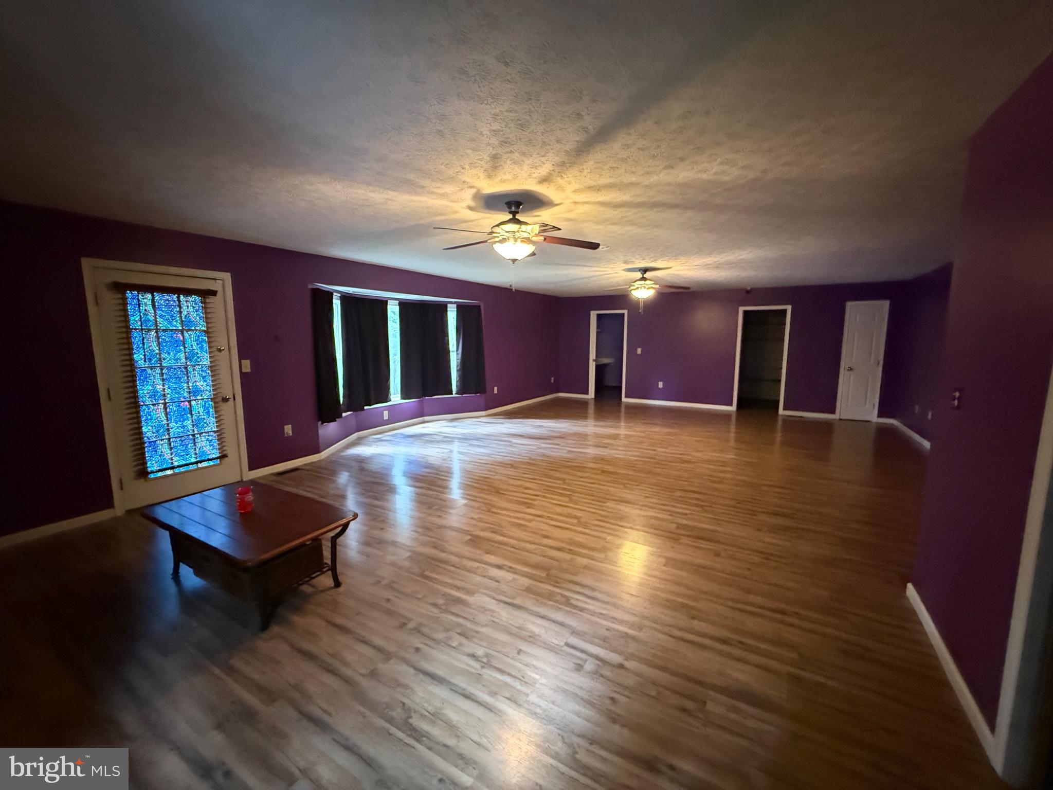 575 North River Highlands Road Delray, WV 26714 - Photo 17 of 50 Vibrant purple space with natural light.