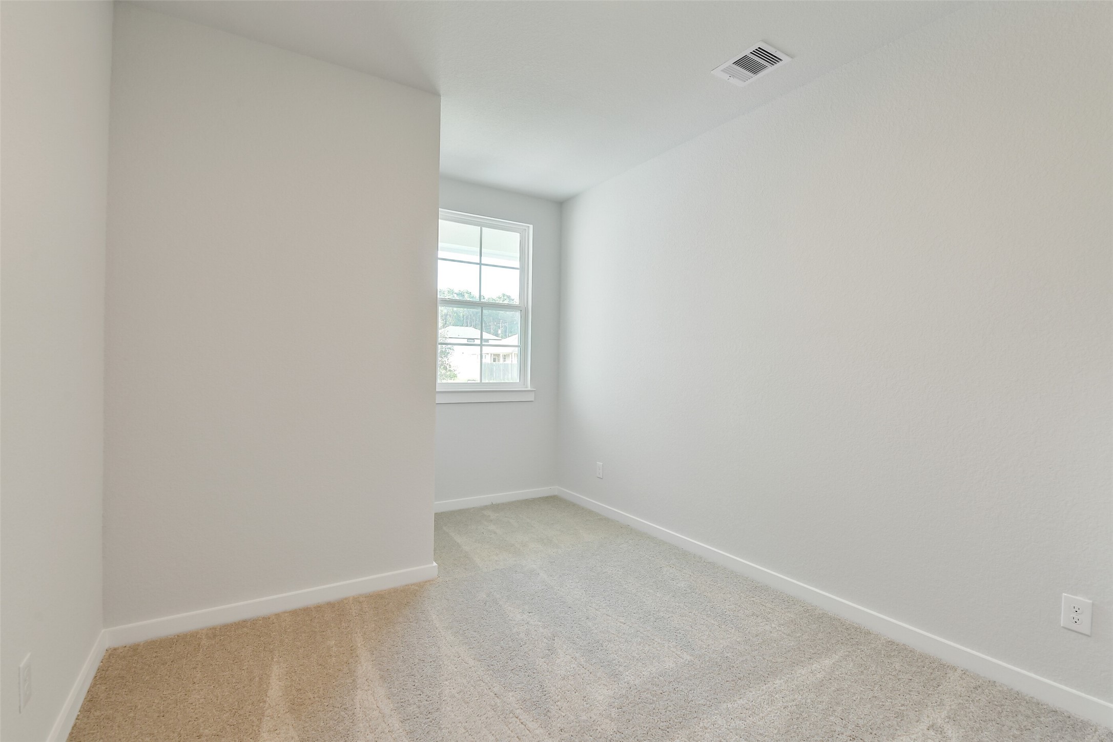 25984 Liberation Road Cleveland, TX 77328 - Photo 28 of 35 an empty room with windows