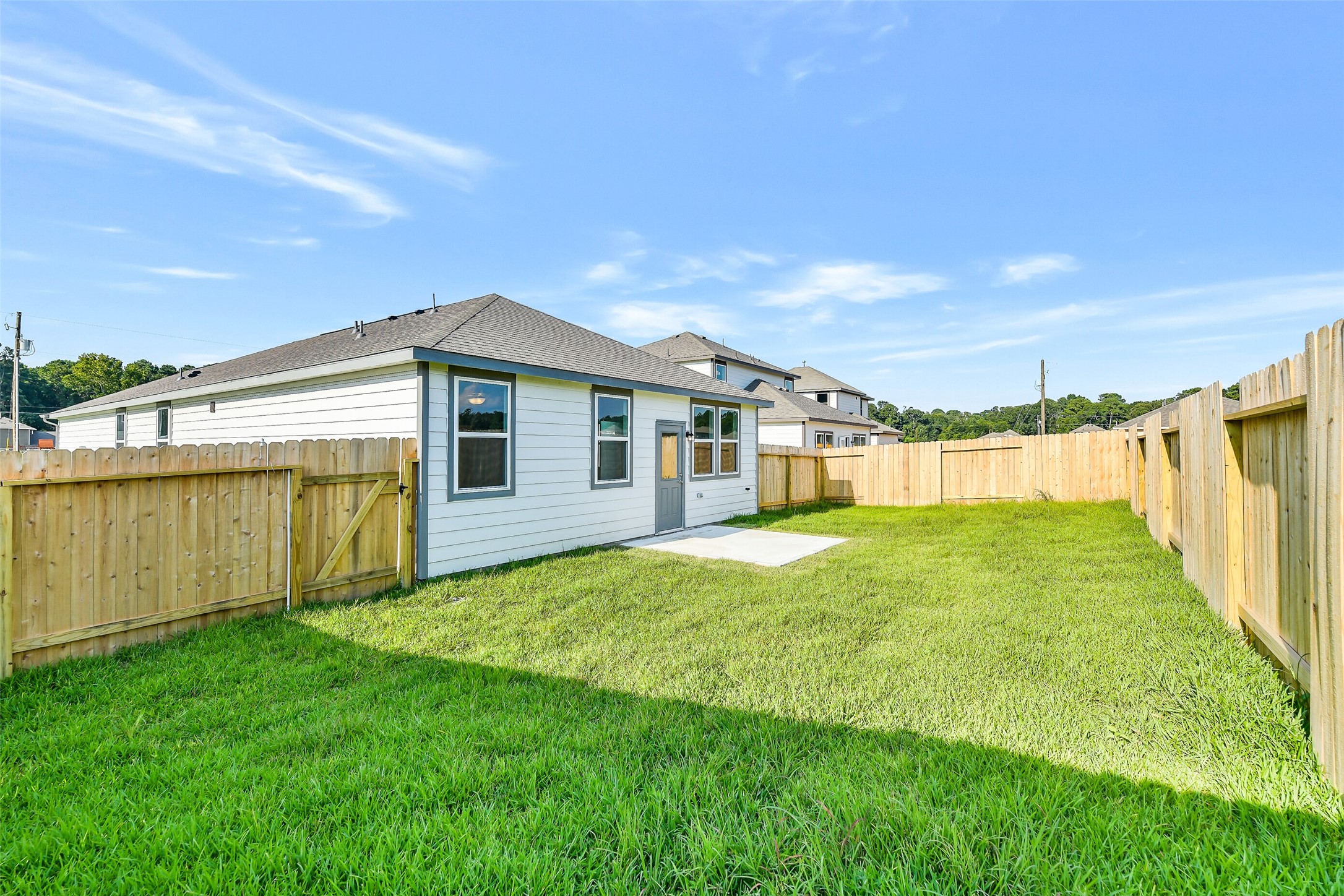 25984 Liberation Road Cleveland, TX 77328 - Photo 32 of 35 a view of a house with backyard and garden