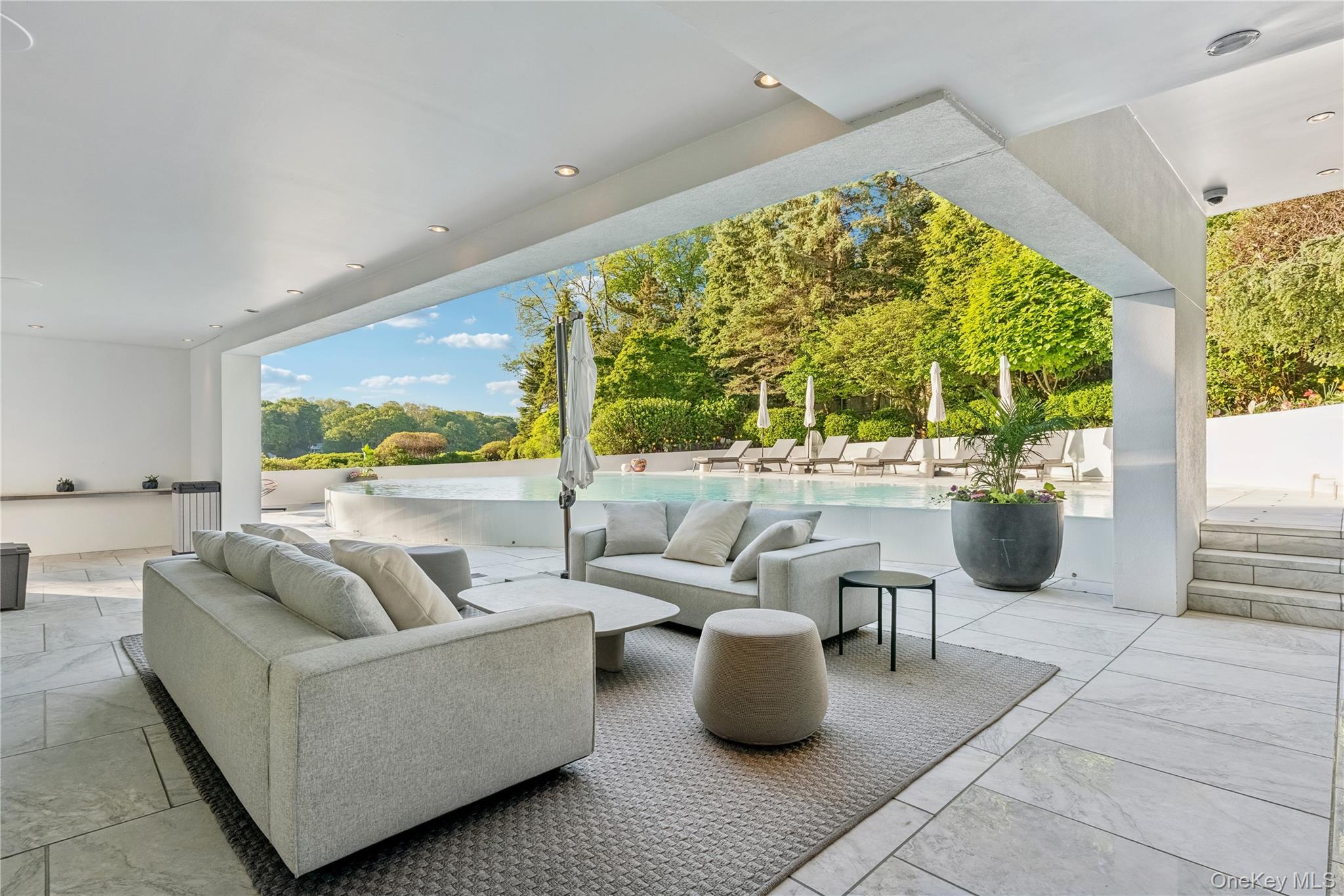 183 Old Field Road Old Field, NY 11733 - Photo 35 of 50 Lower Level Outdoor Living Room Poolside