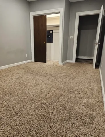 a bathroom with a bathtub and toilet
