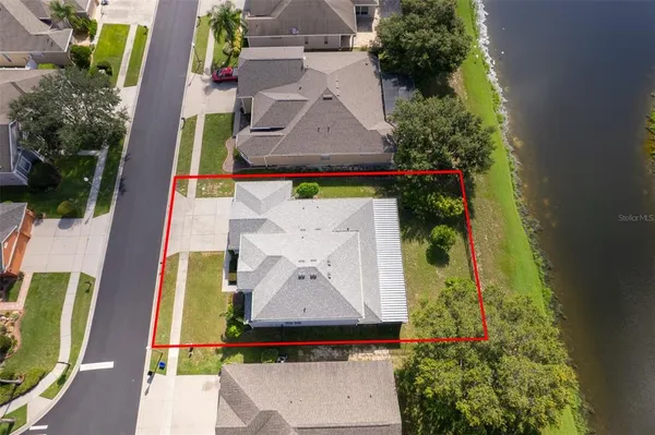 an aerial view of a house with a garden