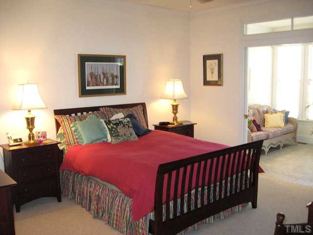 3426 Barron Berkeley Way Raleigh, NC 27612 - Photo 7 of 14 First floor master suite with walk-in closet & access to sunroom Master Suite