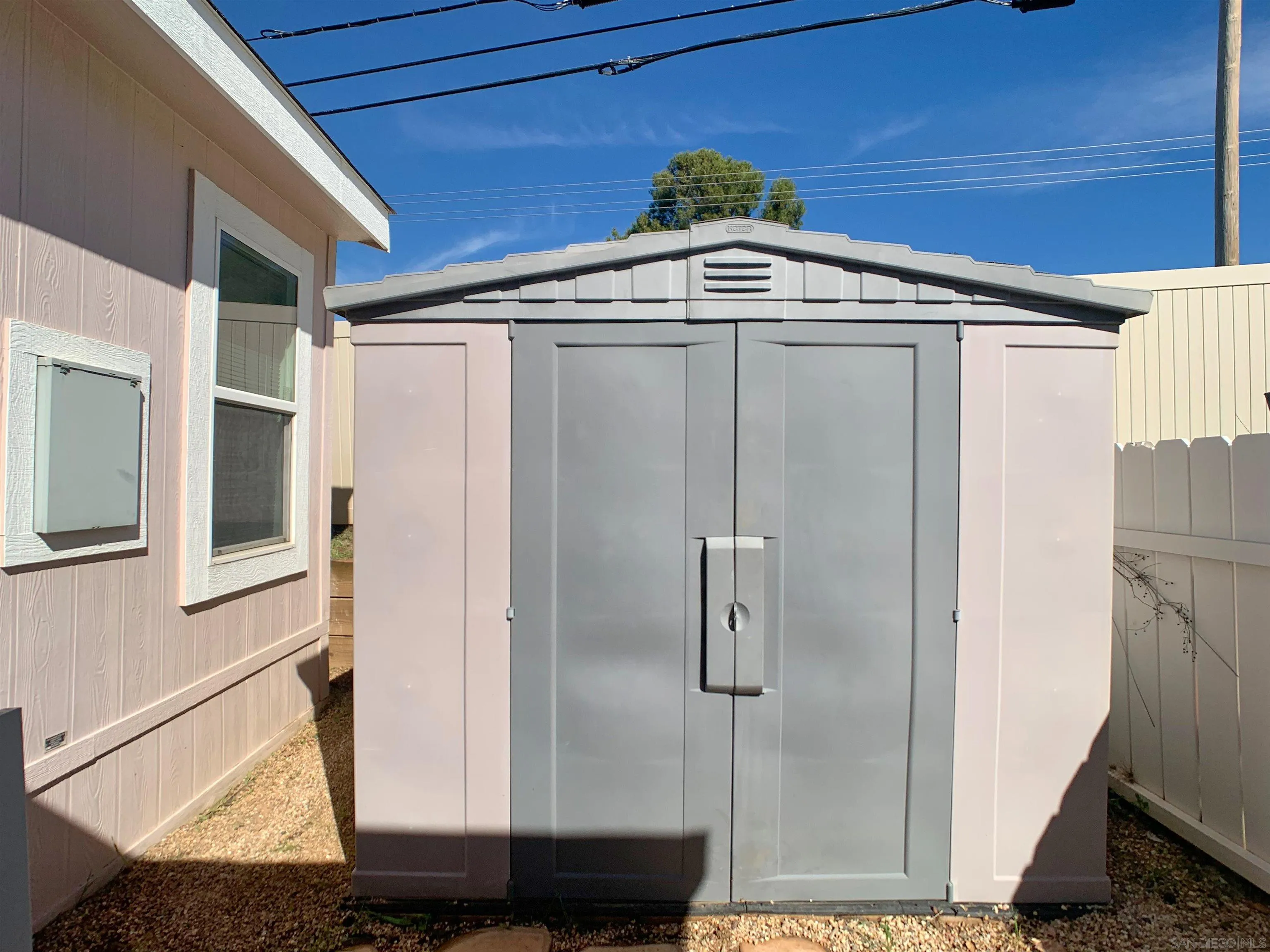 3505 Alpine Boulevard, Unit 57 Alpine, CA 91901 - Photo 6 of 28 This storage shed will stay with the home.