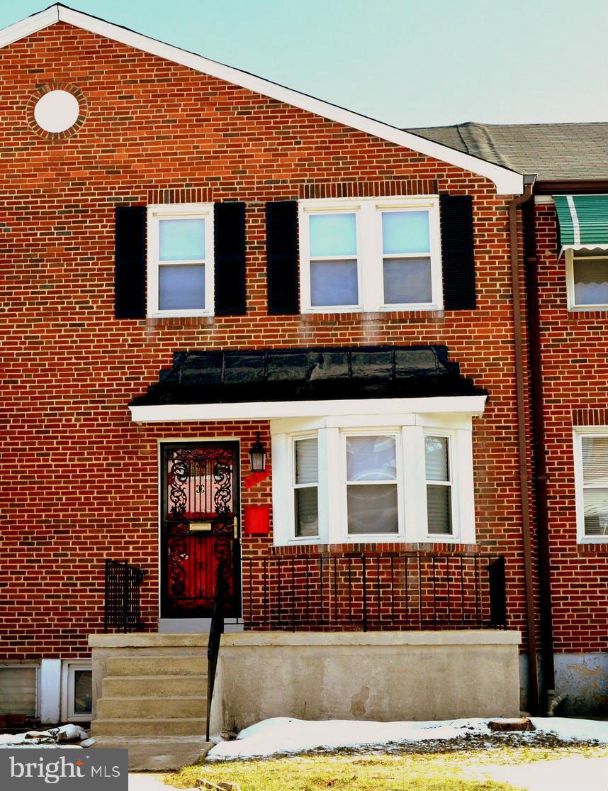 5019 West Hills Road Baltimore, MD 21229 - Photo 1 of 30 a front view of a house