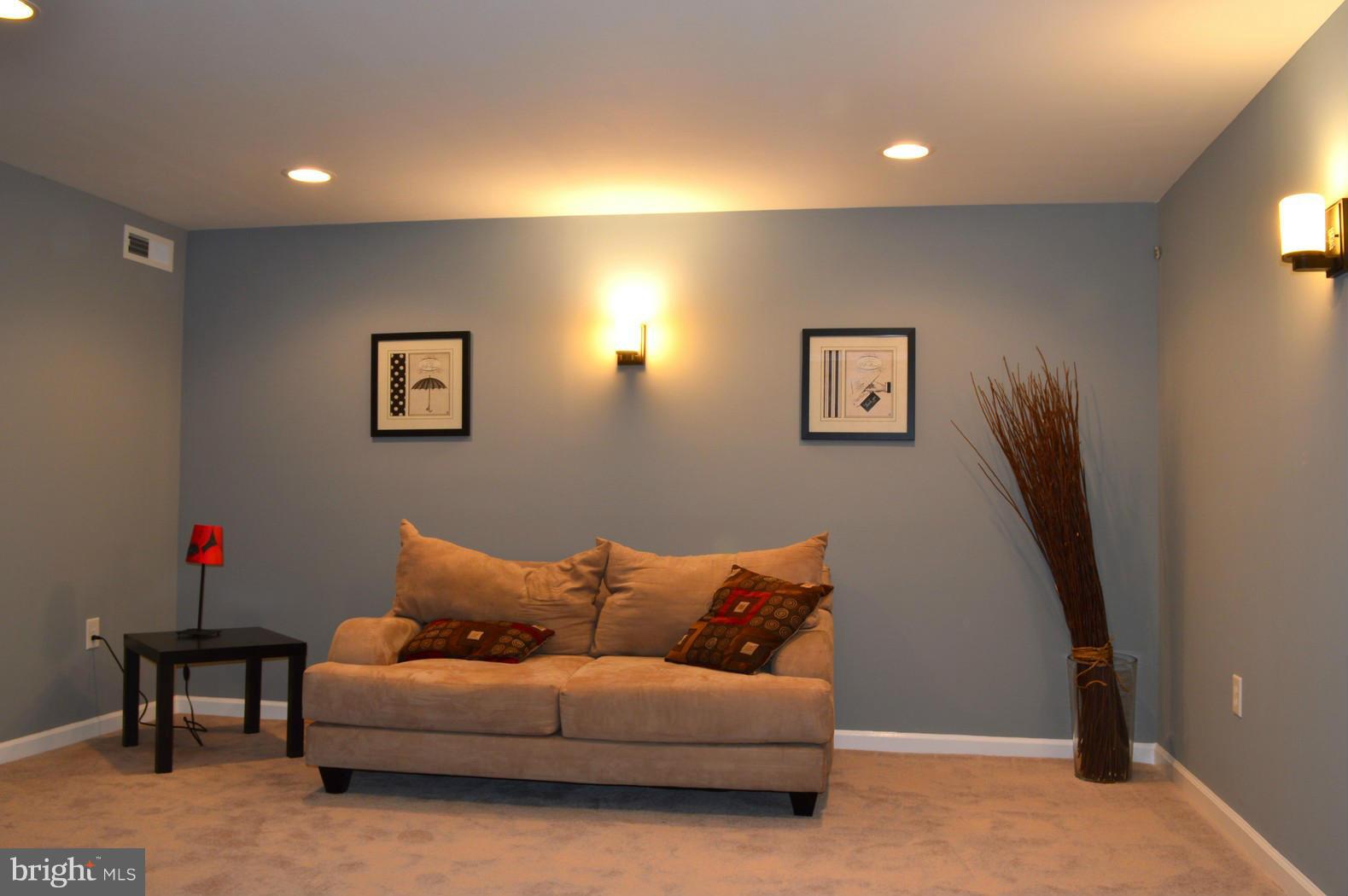 5019 West Hills Road Baltimore, MD 21229 - Photo 17 of 30 a living room with furniture and a window