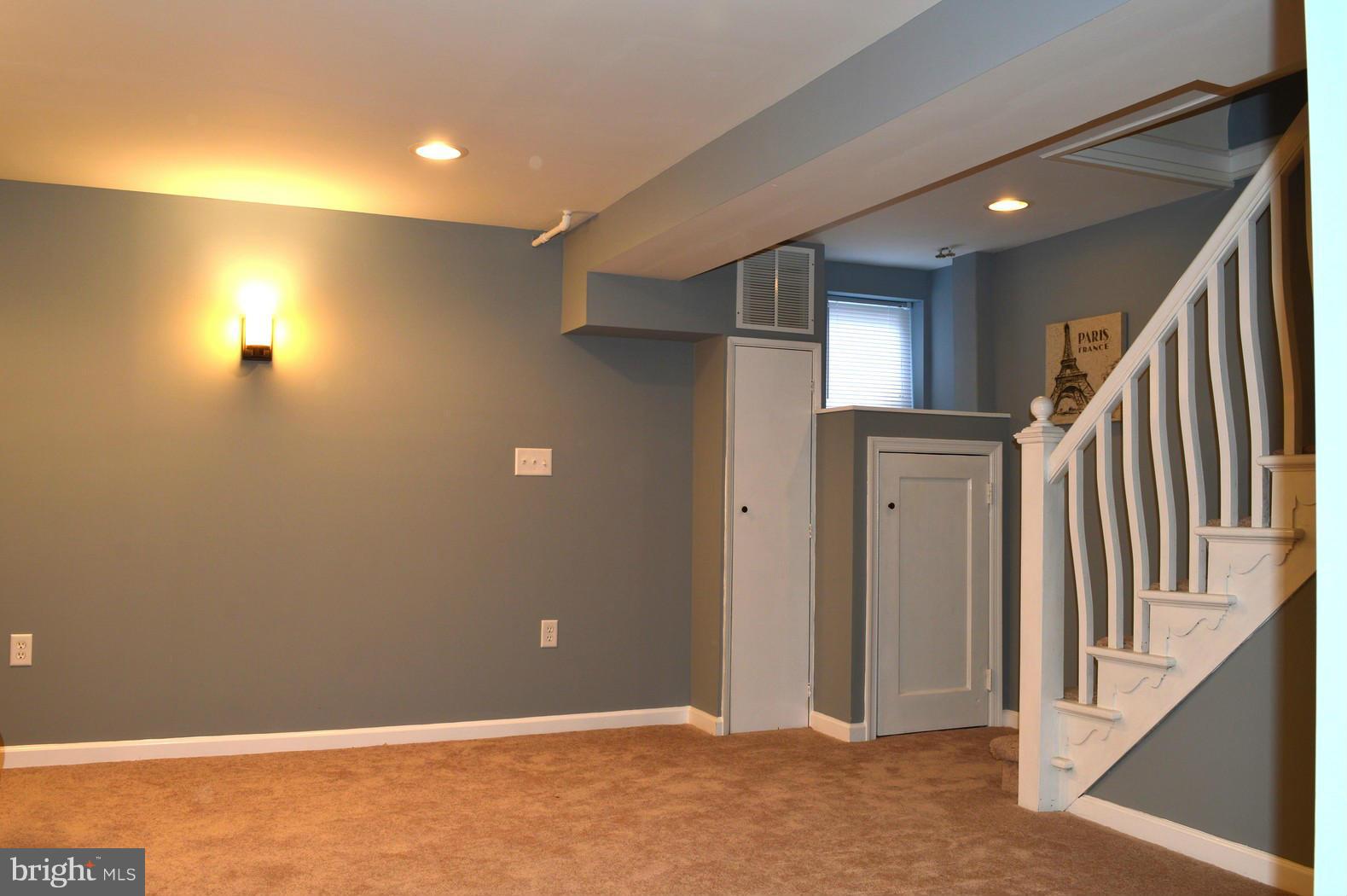 5019 West Hills Road Baltimore, MD 21229 - Photo 19 of 30 a view of an empty room with stairs
