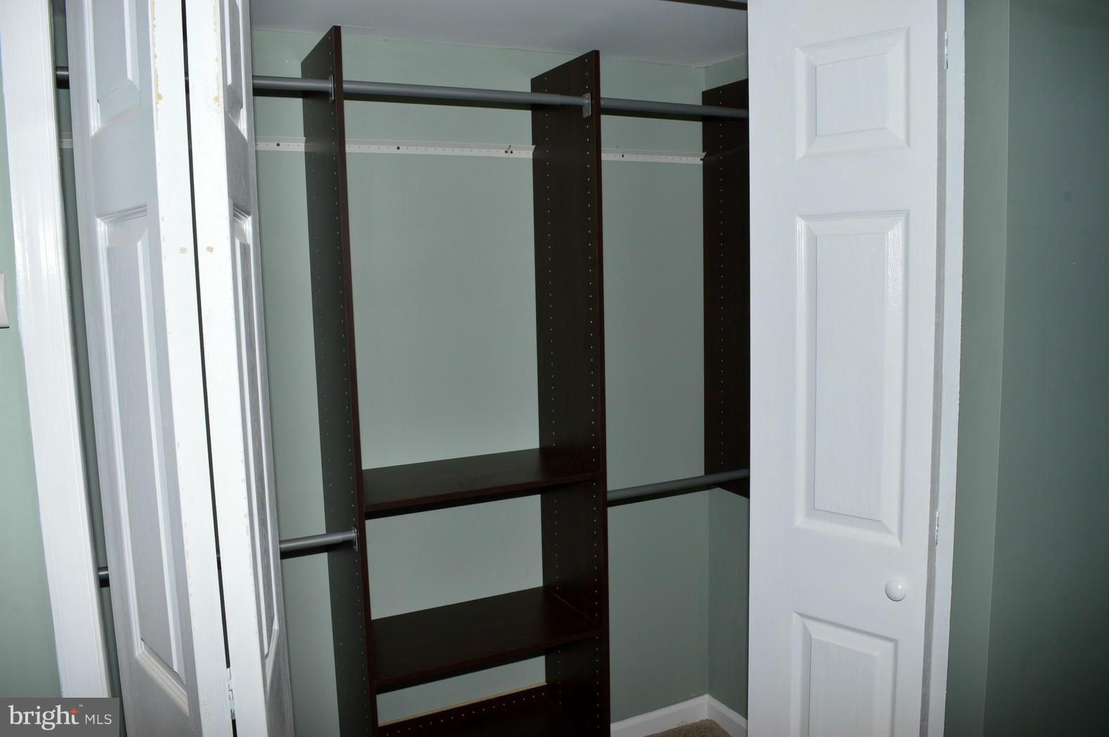5019 West Hills Road Baltimore, MD 21229 - Photo 23 of 30 a bathroom with a glass shower door