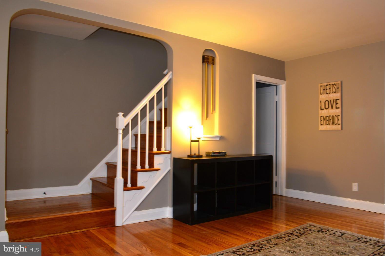 5019 West Hills Road Baltimore, MD 21229 - Photo 5 of 30 a view of entryway and hall with wooden floor