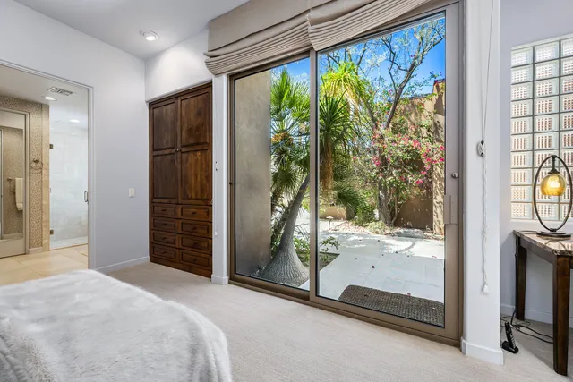 a view of a room with a large window