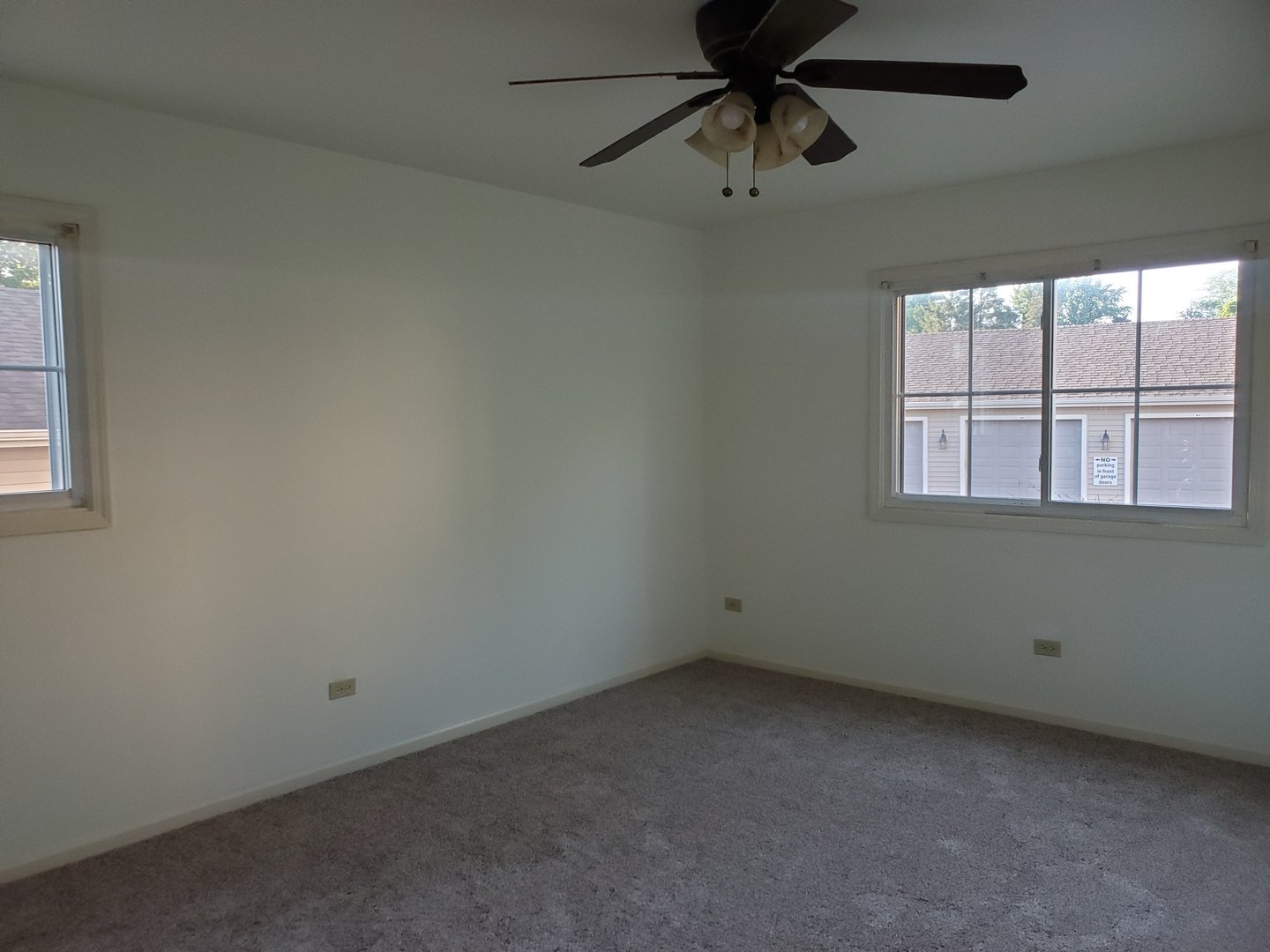 833 Village Quarter Road, Unit G4 West Dundee, IL 60118 - Photo 10 of 15 an empty room with a window