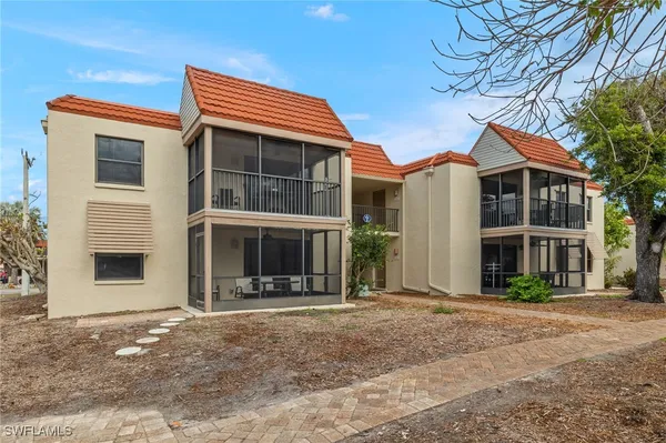 a view of a terrace with chairs