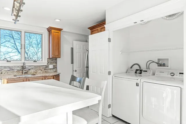 a view of a brick house with a large window