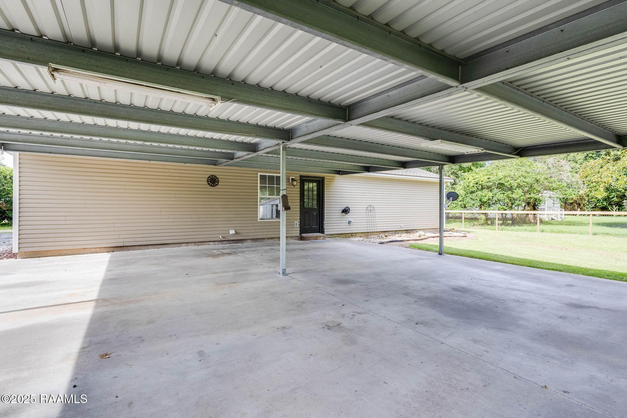 400 Lebesque Road Lafayette, LA 70507 - Photo 16 of 17 Carport and back entrance