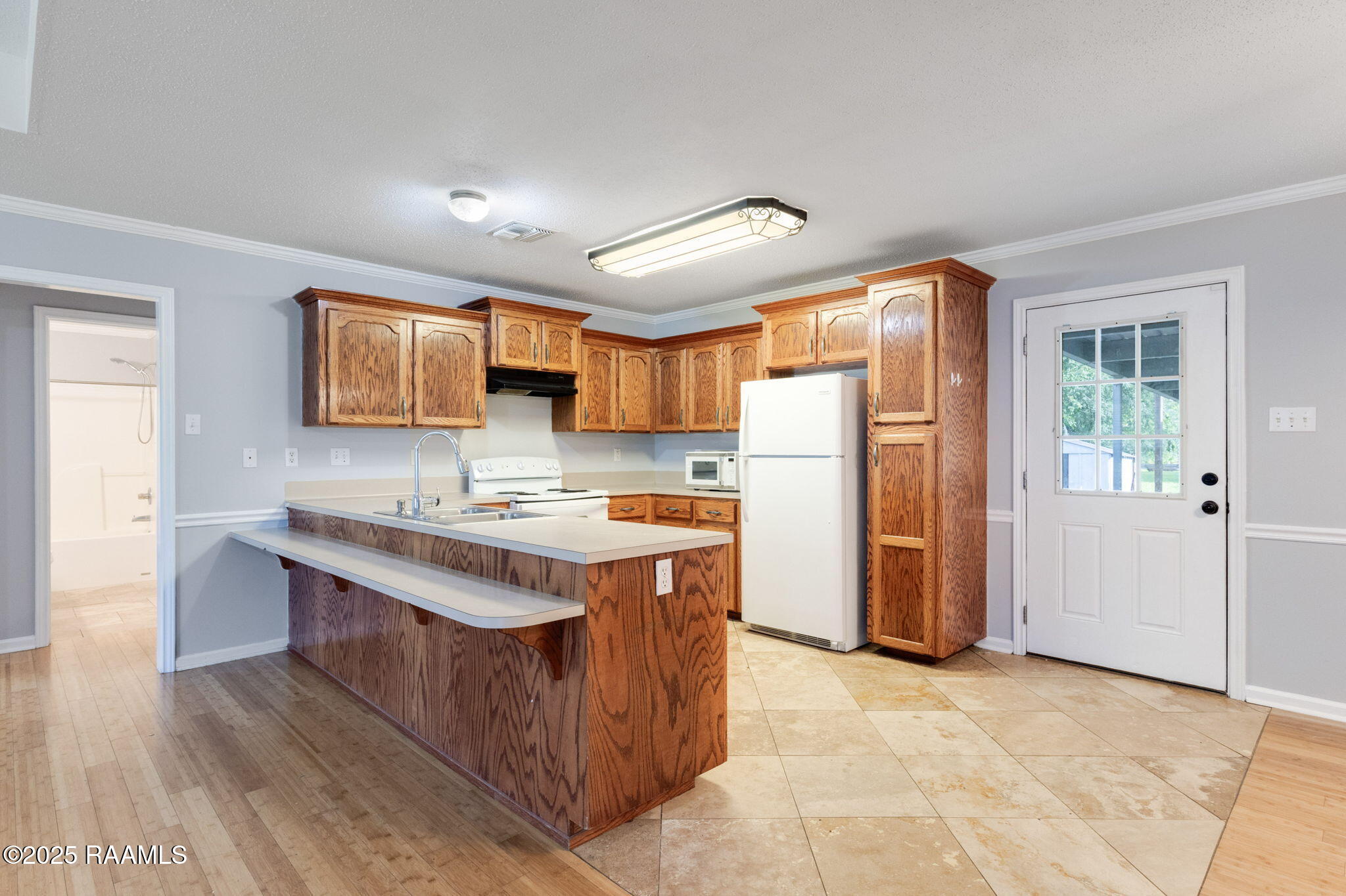 400 Lebesque Road Lafayette, LA 70507 - Photo 4 of 17 Kitchen to Back Door