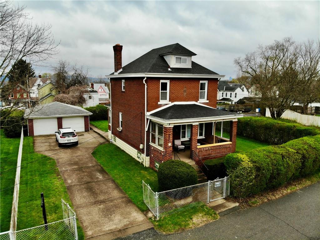 2 Juvet Street McKees Rocks, PA 15136 - Photo 23 of 25 a front view of a house with yard and green space