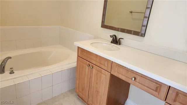 a bathroom with a sink and a bathtub
