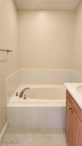 a bathroom with a bathtub
