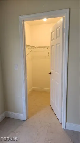 an empty room with a natural light