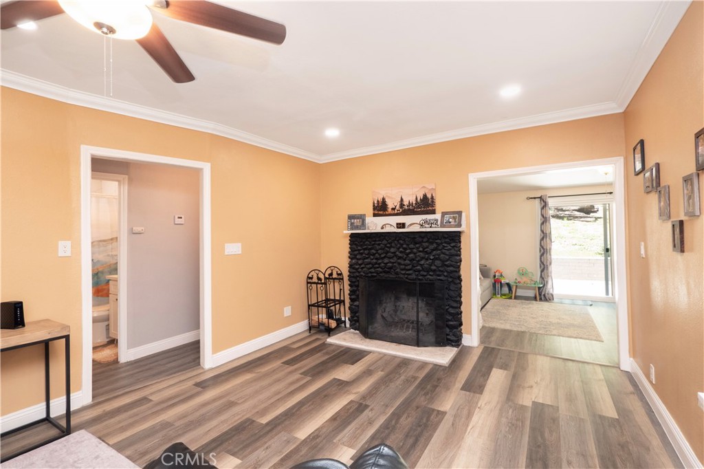 18839 Deer Trail Road Banning, CA 92220 - Photo 16 of 47 a view of a livingroom with a fireplace