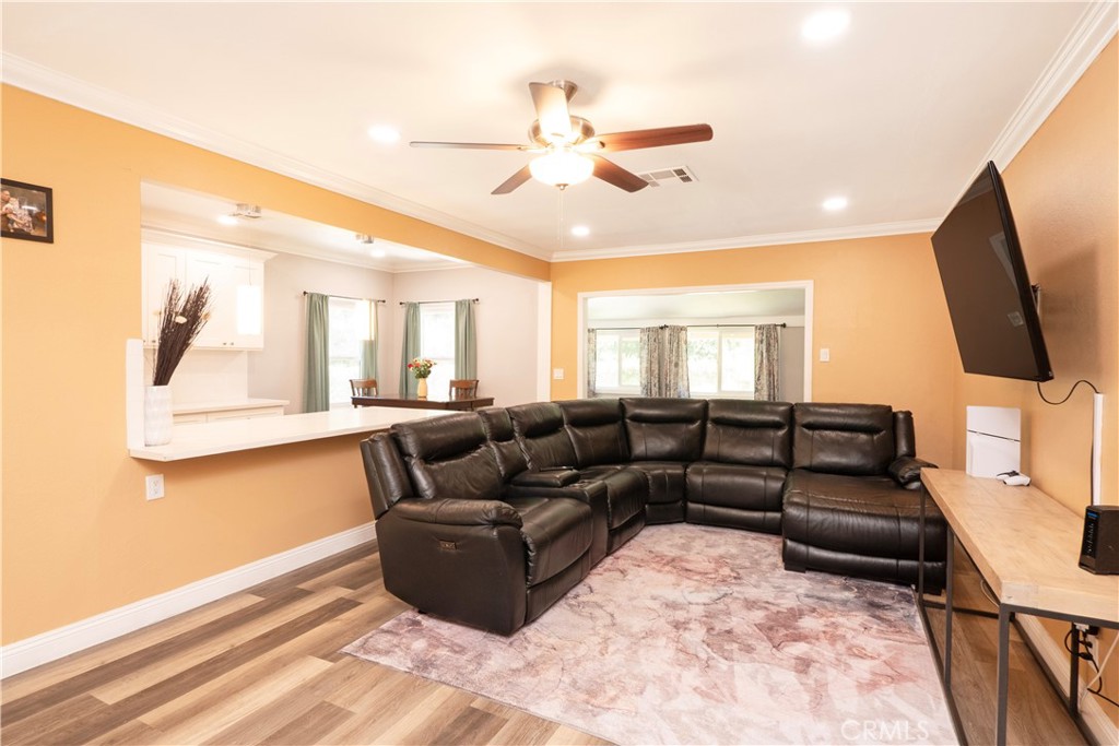 18839 Deer Trail Road Banning, CA 92220 - Photo 17 of 47 a living room with furniture and a flat screen tv