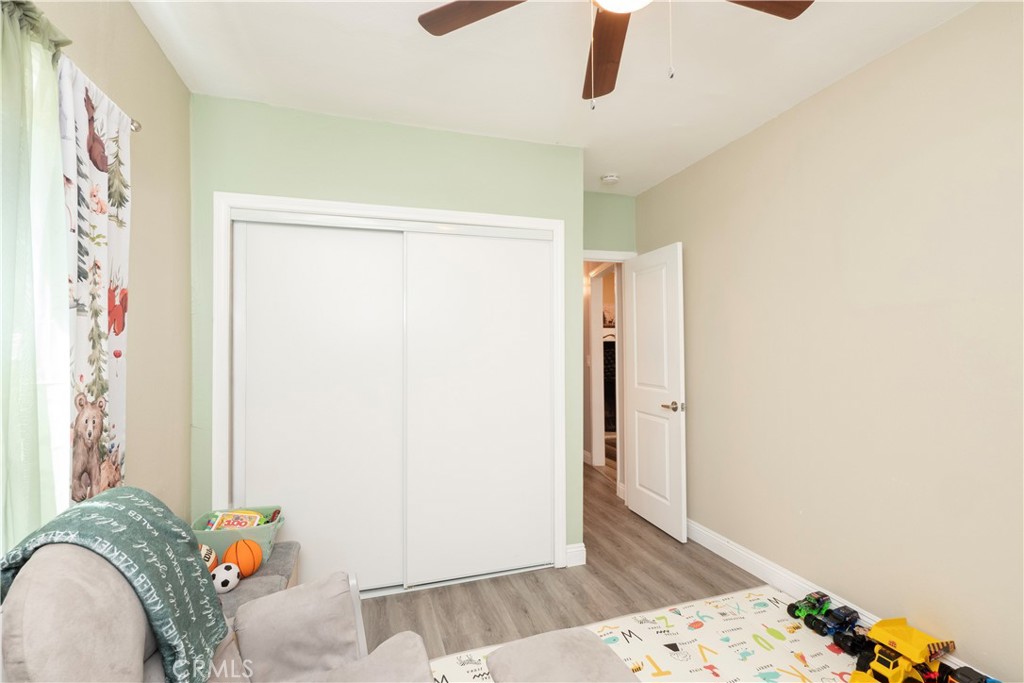 18839 Deer Trail Road Banning, CA 92220 - Photo 23 of 47 a view of livingroom with furniture and wooden floor