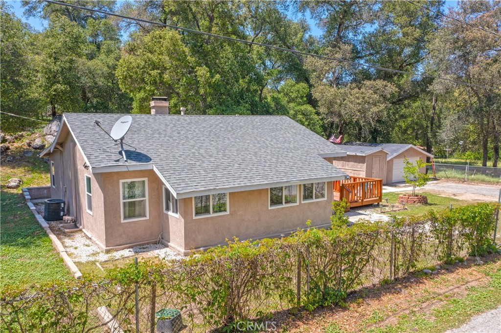 18839 Deer Trail Road Banning, CA 92220 - Photo 4 of 47 an aerial view of a house with a yard table and chairs