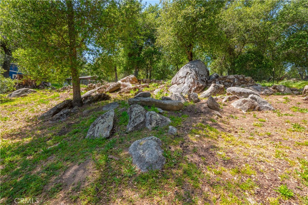 18839 Deer Trail Road Banning, CA 92220 - Photo 41 of 47 a backyard of a house with lots of green space