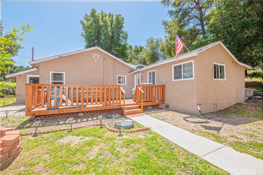 18839 Deer Trail Road Banning, CA 92220 - Photo 8 of 47 a view of a house with backyard and sitting area