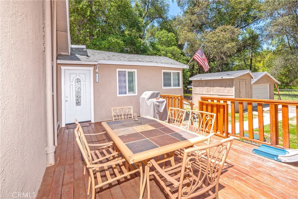 18839 Deer Trail Road Banning, CA 92220 - Photo 9 of 47 a view of a patio with a table and chairs