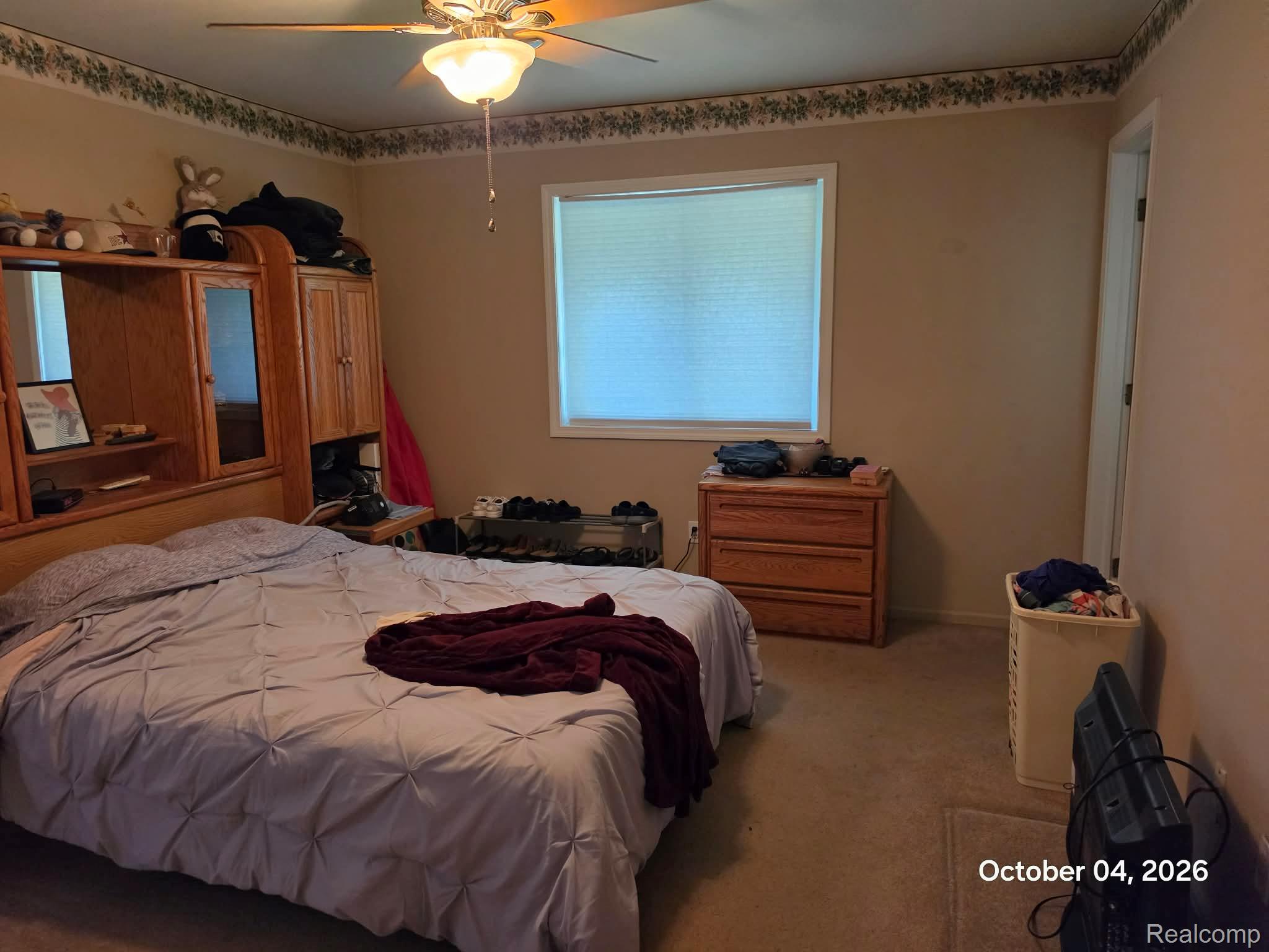 34781 Union Lake Road Clinton Township, MI 48035 - Photo 17 of 38 Window with blinds, ceiling fan with light fixture, wall-to-wall carpeting, and neutral wall tones
