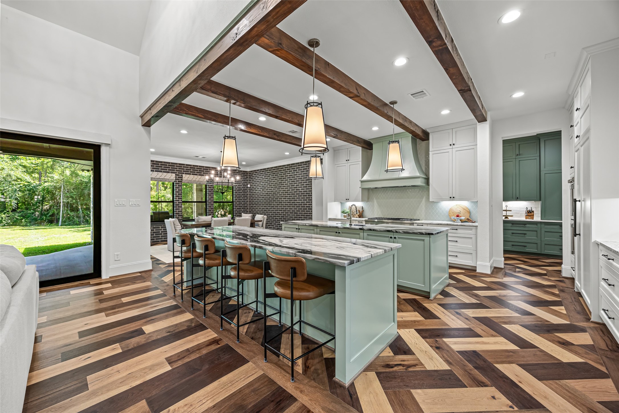 19314 Chateau Ridge Court Tomball, TX 77377 - Photo 8 of 50 Featuring two functional islands, perfect for cooking, prep, and entertaining
