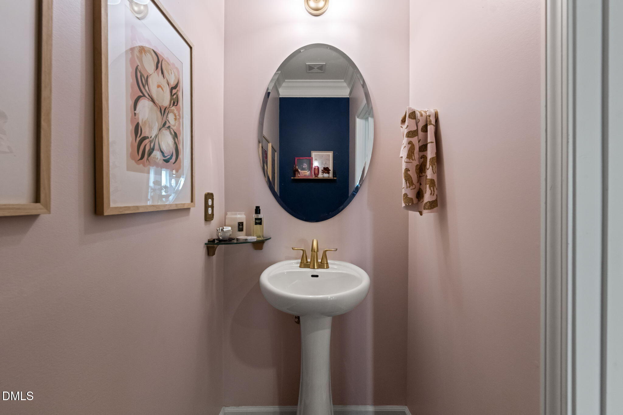 1716 Main Divide Drive Wake Forest, NC 27587 - Photo 17 of 45 a bathroom with a sink and a mirror