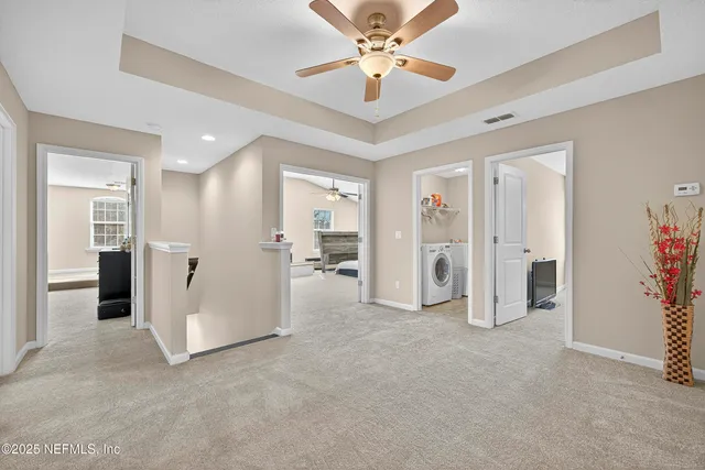 a bedroom with bed and window