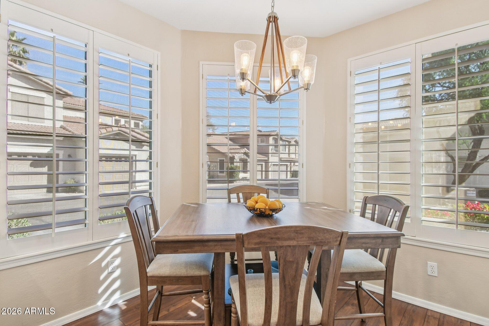 1024 East Frye Road, Unit 1039 Phoenix, AZ 85048 - Photo 9 of 32 a view of a dining room with furniture and window