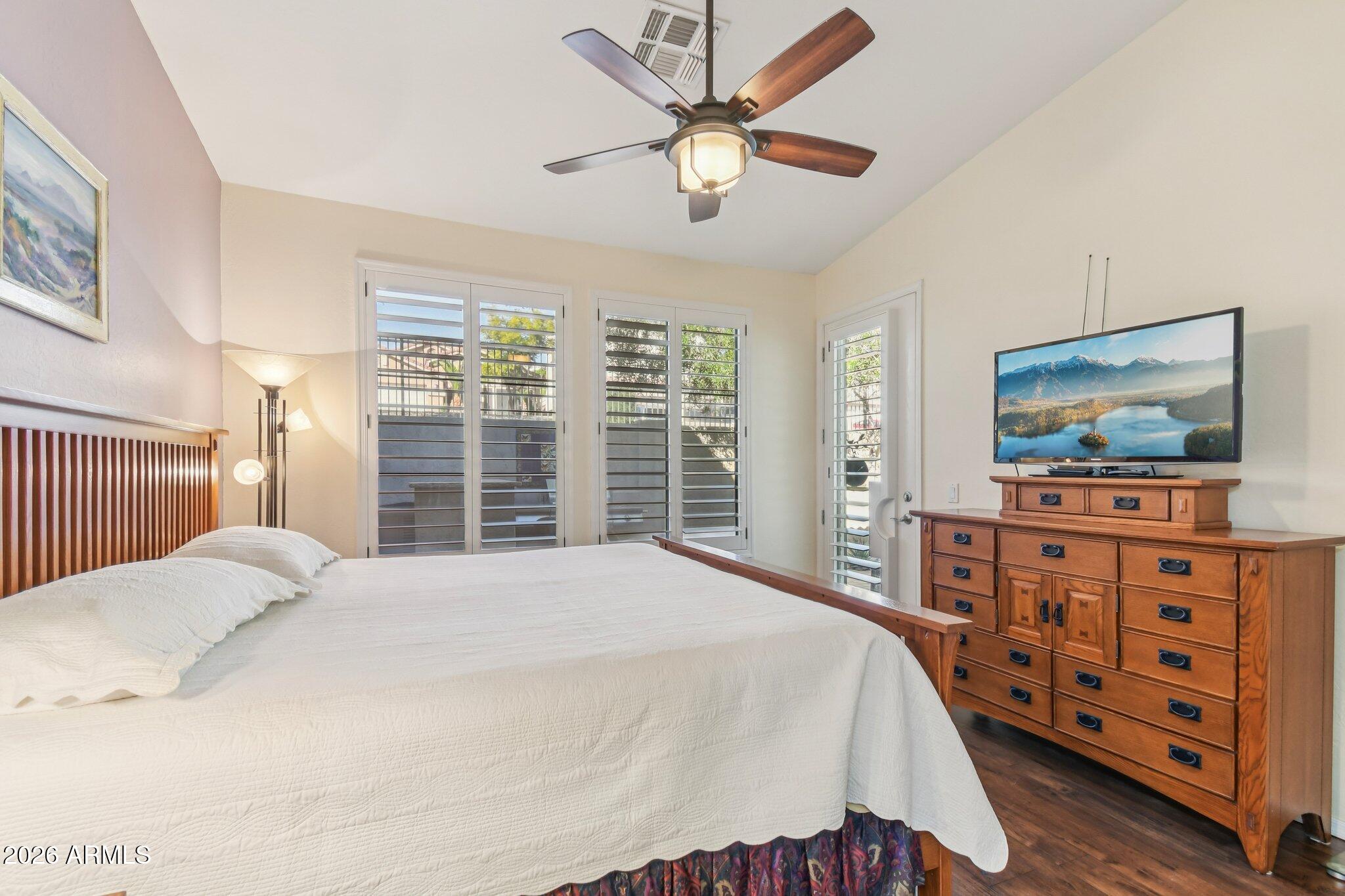 1024 East Frye Road, Unit 1039 Phoenix, AZ 85048 - Photo 13 of 32 a bedroom with a bed and a flat screen tv